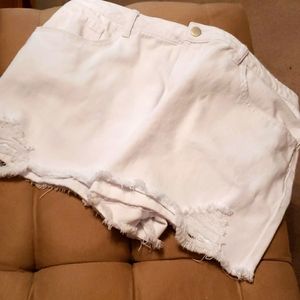 Ripped at the leg freyed shorts